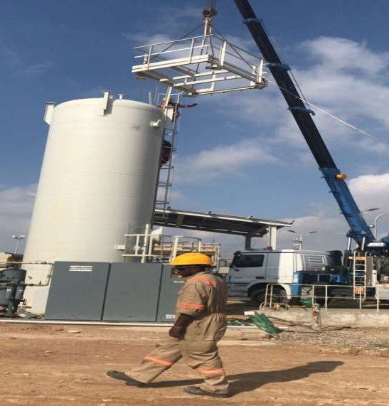 Vessel erection by crane in southern Iraq